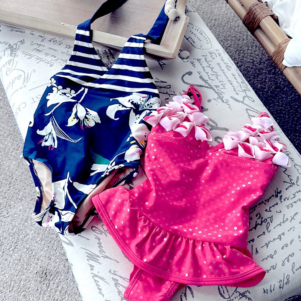 3t Tea brand. Swimsuits. Pink polka dot and blue floral. Sold as a a pair.